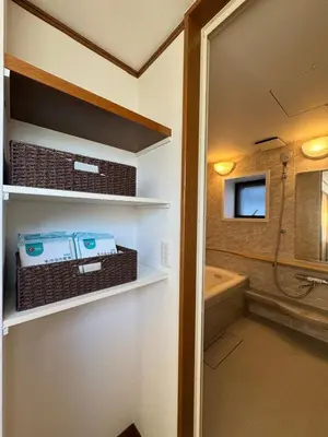 a bathroom with a walk in shower and a tub at sun inn in Tokyo
