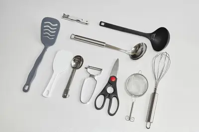 a group of kitchen utensils on a white surface at Paradiso\u9752\u6238 in Tokyo