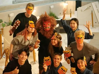 a group of people dressed in costumes posing for a picture at GRAND HOSTEL LDK Tokyo Nishikasai -GRAND OPENING In May 2025- in Tokyo