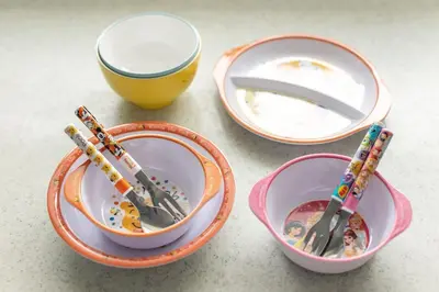three bowls with utensils in them on a table at Sangenjaya 102 square meters 3 Bedroom 2 bathrooms in Tokyo
