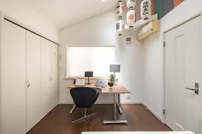 an office with a desk and a chair in a room at Sangenjaya 102 square meters 3 Bedroom 2 bathrooms in Tokyo