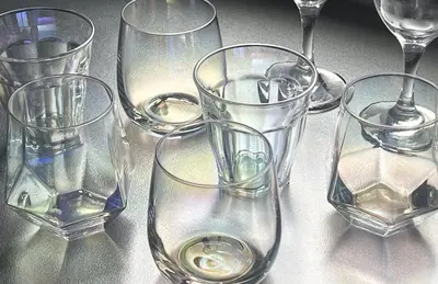 a group of empty glasses sitting on a table at \u6c60\u888b\u672c\u753a3,4\u968e in Tokyo