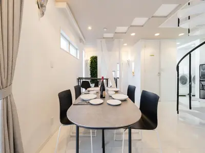 a dining room with a table and chairs at Shinjuku 2min 140 Square meters VR Switch Photo Booth pc in Tokyo