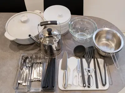 a table with utensils on a counter top at Shinjuku 2min 140 Square meters VR Switch Photo Booth pc in Tokyo