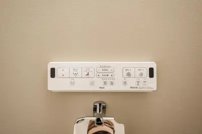 a close up of a control panel on a wall at Mi-HOTEL QUALIA SHINJUKU in Tokyo