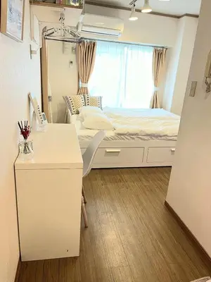 a bedroom with a bed and a desk in it at 25Yamanote JR line Takadanobaba sat 5mit Netflix watch!Up to 3 people! in Tokyo