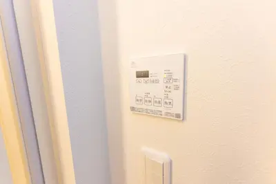 a switch on a wall in a room at Fox & Fortune 4B -New Near station Luggage storage Netflix- in Tokyo