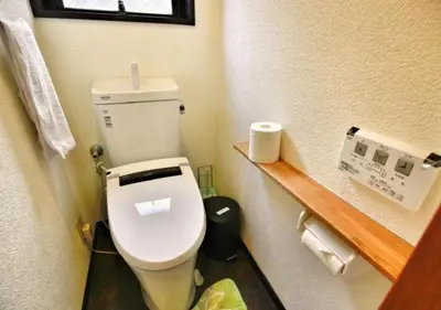 a small bathroom with a toilet in a room at Alice 501 in Tokyo