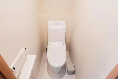 a small bathroom with a white toilet in a room at saiei hotel 301 in Tokyo