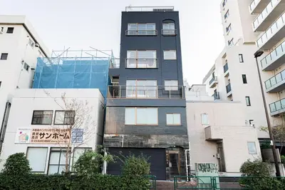 an apartment building in the city of osaka at saiei hotel 302 in Tokyo