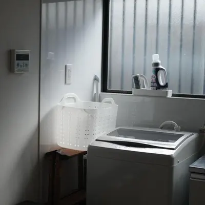 a bathroom with a sink and a washing machine at Oji House-KI0022 in Tokyo