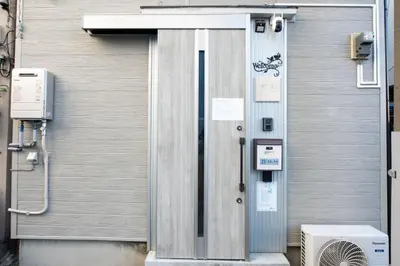 a door on the side of a building at First Look House-SM0028 in Tokyo