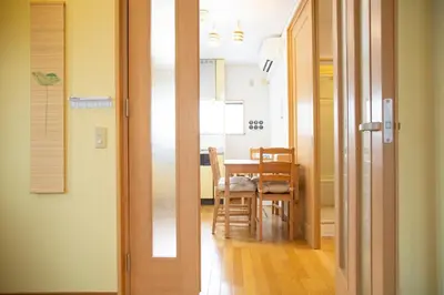 a kitchen and dining room with a table and chairs at Near Skytree 6-minute walk from Keisei Tokifune, direct access to Airport in Tokyo