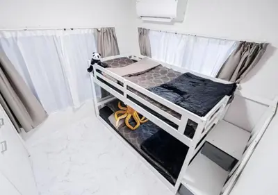 an overhead view of a bunk bed in a room at Kasai Light Luxury House 101 in Tokyo