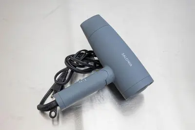 a blue charger with a black cord plugged into it at \u3077\u3075\u304b\u30bf\u30de\u30ce\u30a4-Pufuka Tamanoi in Tokyo