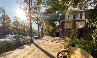 a street with a car parked on a brick sidewalk at The Villa Ebisu BLUE\u60e0\u6bd4\u5bff\u99c5\u5f92\u6b658\u5206 \u9759\u304b\u306a\u4f4f\u5b85\u5730 in Tokyo