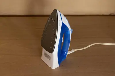 a blue and white appliance sitting on top of a table at Omori House in Tokyo