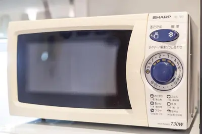 a white microwave oven sitting on top of a counter at P-Yamanote Line shinjuku \u9ad8\u7530\u99ac\u5834 5mins walk Hostel! \u9ad8\u901fWi-fi! Waseda in Tokyo