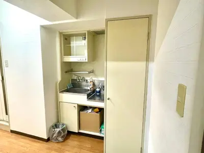 a small kitchen with a sink and a counter at Tokyo West Shinjuku Entire House in Nishishinjuku-gochome in Tokyo