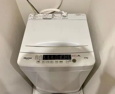a close up of a washing machine in a room at Terrace Tokyo Skytree in Tokyo