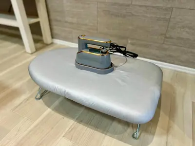 a briefcase is sitting on top of a bench at Terrace Tokyo Skytree in Tokyo