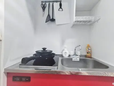 a kitchen sink with a pot on top of it at \u65b0\u5bbf\u4e2d\u5fc3\u5546\u5708-\u65b0\u5927\u4e45\u4fdd\u5f92\u6b654\u5206-\u65b0\u5bbf\u5f92\u6b6510\u5206-2Room-Max4P in Tokyo