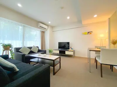 a living room with a couch and a tv at Pangoo Shinagawa Room 203 - Vacation STAY 03802v in Tokyo