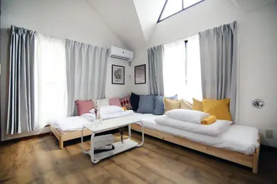 a living room with a couch and a table at nakano202 in Tokyo