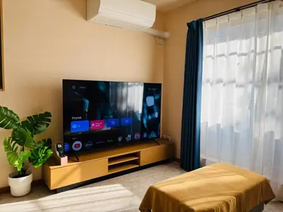 a living room with a large flat screen television at Lapis House - Vacation STAY 03045v in Tokyo