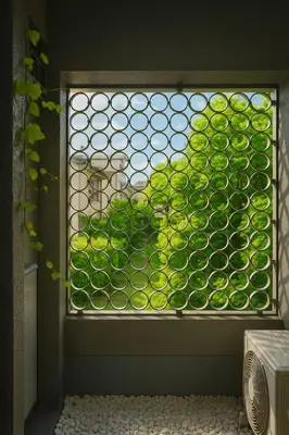 a window with a bunch of green apples at \u7af9\u5185\u30d3\u30eb in Tokyo