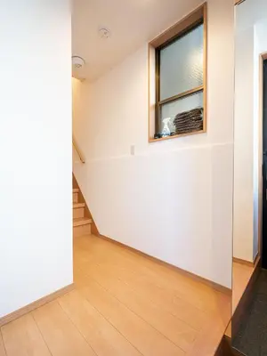 a room with a window and a wooden floor at Familia Omorikaigan in Tokyo