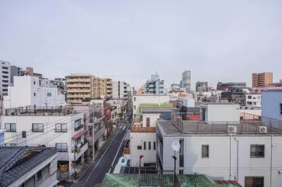 an aerial view of a city with buildings at Wasabi Sky Oshiage \u62bc\u4e0a\u99c5\u5f92\u6b69\u30a2\u30d1\u30fc\u30c8 in Tokyo