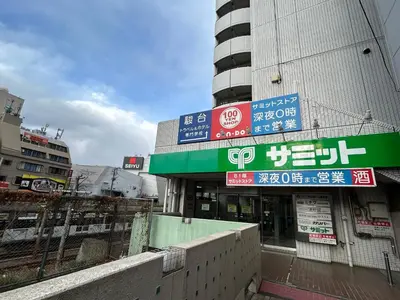 a building with signs on the side of it at \u6c60\u888b\u5de3\u9d28\u30cf\u30a6\u30b9\u4e00\u68df\u4e38\u3054\u3068\u8cb8\u5207\u308aIkebukuro Sugamo House-Private Entire Building in Tokyo