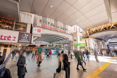 a crowd of people walking in a shopping mall at Mori hotel AKIHABARA 2 in Tokyo