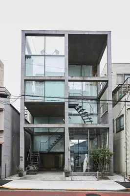 a large glass building with a staircase in it at Natsumezaka Room2 NM2 in Tokyo