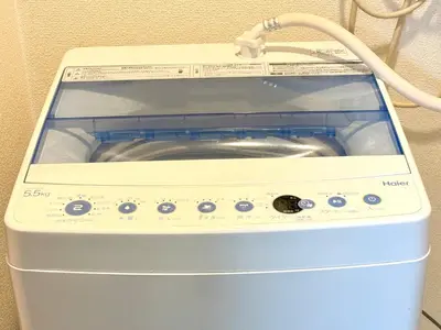 a washer and dryer sitting in a room at Shinjuku\u5927\u4e45\u4fdd3 in Tokyo