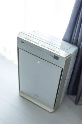 a computer monitor sitting on the floor next to a window at Close to SHIBUYA! 6beds New & Comfortable Stay! in Tokyo