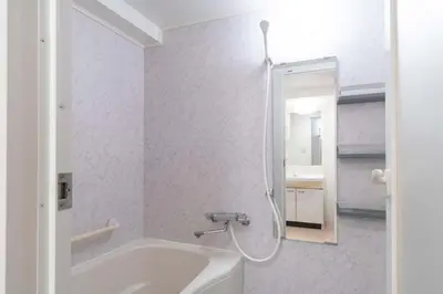 a bathroom with a shower and a tub and a sink at Daffitto\u5929\u738b\u6d32 in Tokyo