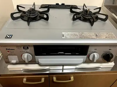a stove top with two burners on top of it at NKm\u6625\u6c5f\u753a3\u4e01\u76ee in Tokyo