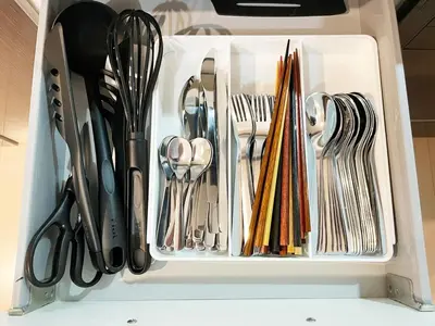 a white drawer filled with utensils at \u5927\u5cf65\u4e01\u76ee in Tokyo