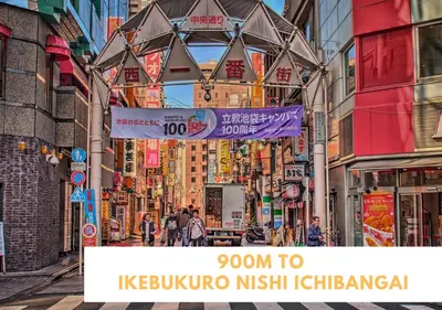 a city street with many signs and buildings at COMMA HOUSE Kitaikebukuro 202 in Tokyo
