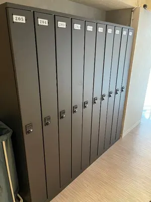 a row of lockers in a locker room at Dogen sauna&stay in Tokyo