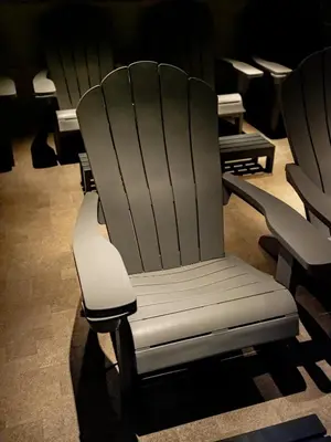 a white chair sitting in a room at Dogen sauna&stay in Tokyo