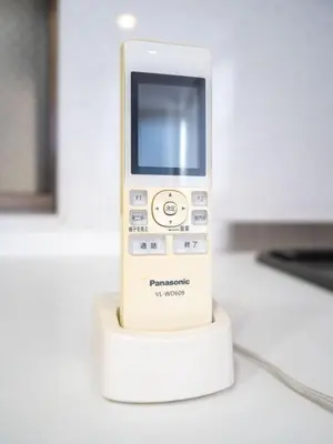 a cell phone sitting on top of a table at FAMILIA OMORIKAIGAN - Vacation STAY 18448 in Tokyo