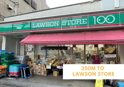 a store with a red awning in front at COMMA HOUSE Kitaikebukuro 302 in Tokyo