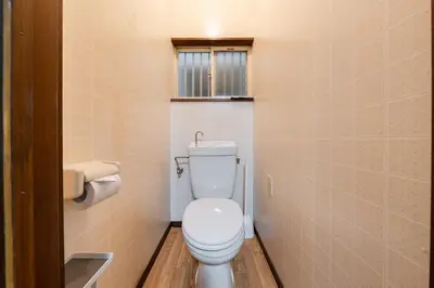 a bathroom with a white toilet in a room at 4-chome House Senju 1F - Cozy Japanese-Style Apartment, 8 min to Kita-Senju in Tokyo