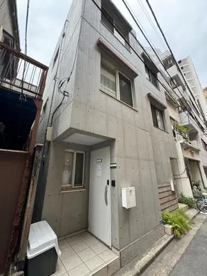a building with a door on the side of it at P O IN T - Okachimachi Akihabara Designer's Home in Tokyo