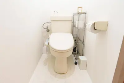 a bathroom with a white toilet in a stall at \u30aa\u30fc\u30d7\u30f3\u7279\u4fa1 \u5317\u658e \u5bcc\u58eb\u306e\u9593 \u6c60\u888b4\u5206 \u65b0\u5bbf16\u5206 \u6e0b\u8c3721\u5206 in Tokyo
