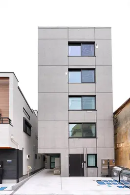 an image of a gray building at YXD102 Direct Skytree convenience facilities in Tokyo