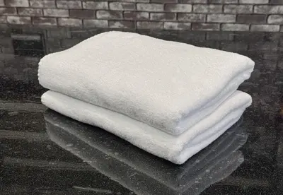 a pile of white towels sitting on top of a table at -Blue sky4F- \u4e09\u30ce\u8f2a\u30ea\u30d3\u30f3\u30b0\u5e83\u3044\u3086\u3063\u305f\u308a\u533a\u9593\u30b7\u30f3\u30d7\u30eb\u306a\u7d20\u6575\u306a\u73cd\u3057\u3044\u5e83\u3044\u304a\u5bb6 in Tokyo